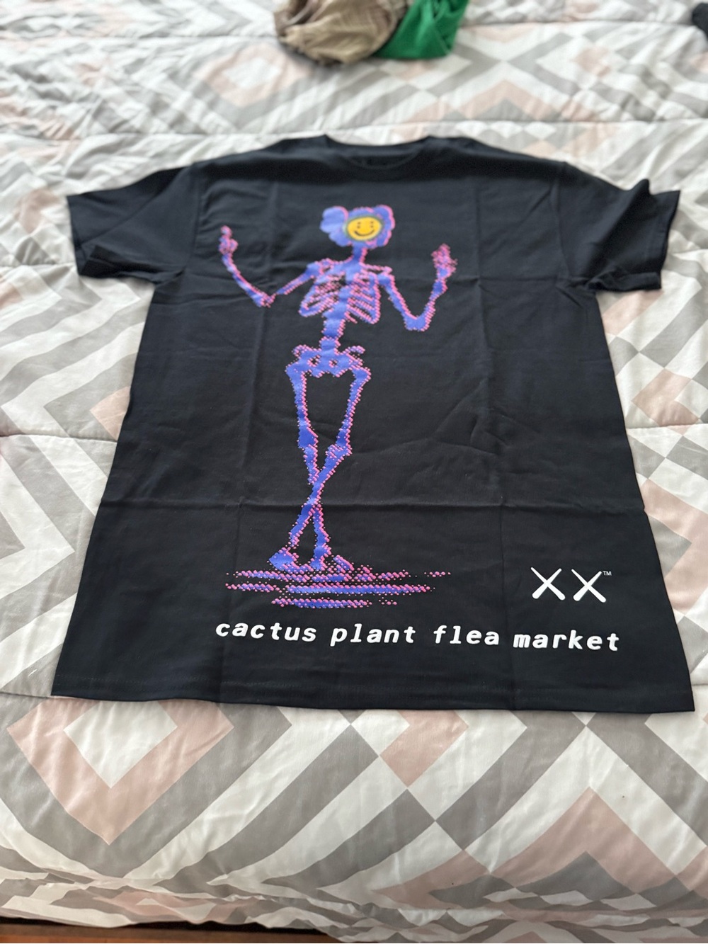 Kaws Cactus Plant Flea Market Black Tee with White Tag Print